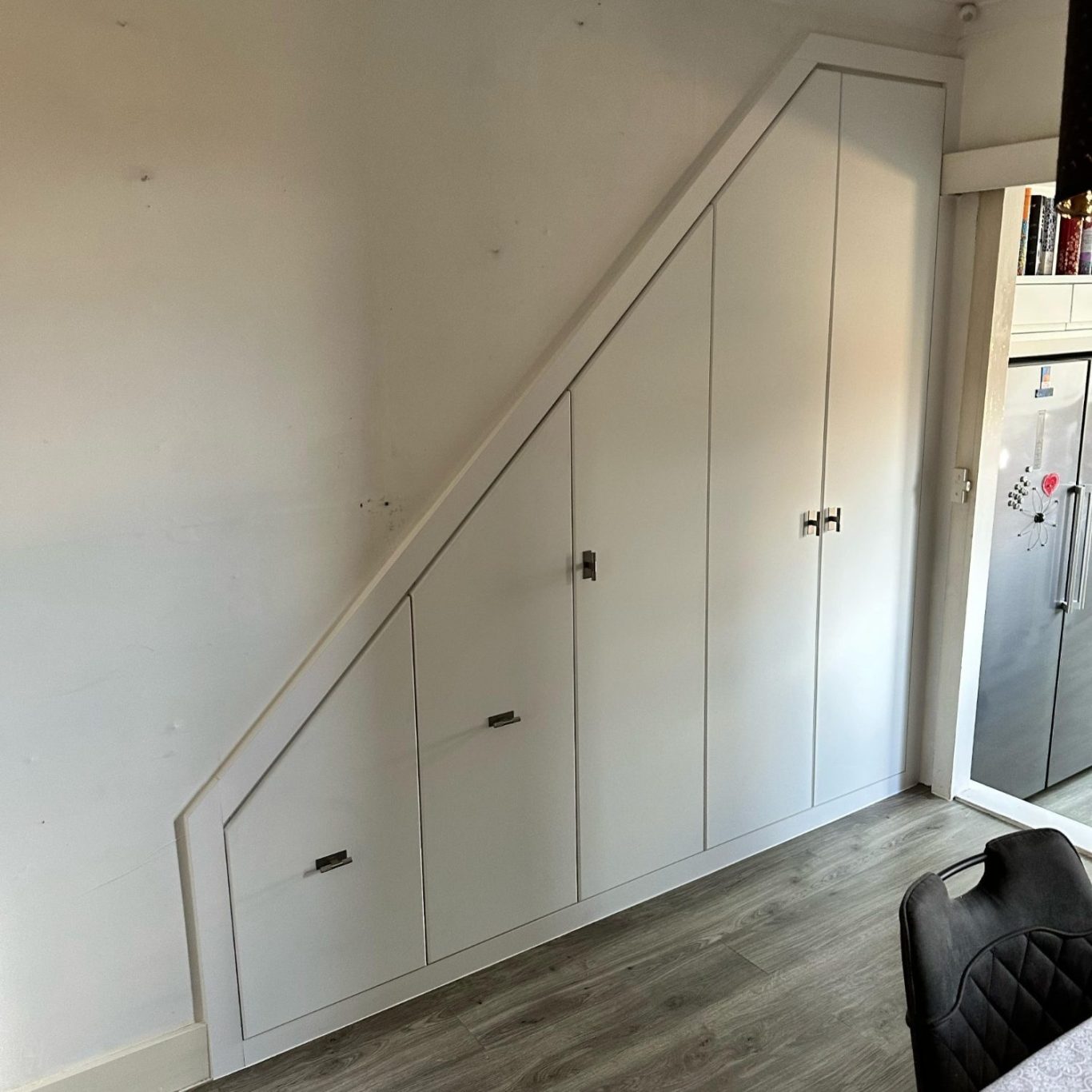 Made to measure, bespoke fitted understairs cupboards with pull out drawers in Kent and Maidstone.
