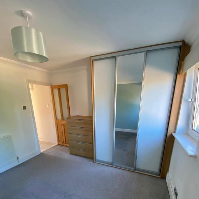 3 door made to measure, bespoke fitted sliding wardrobe  in Kent and Maidstone with a 5 draw, drawer unit fitted on the side.