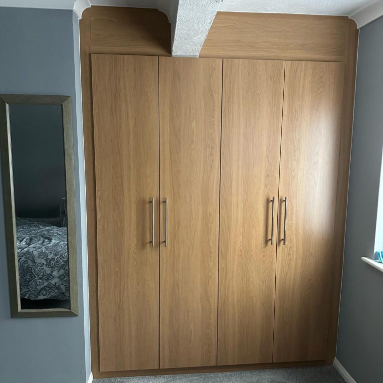 Bespoke fitted, made to measure 4 door hinged wardrobe in Kent and Maidstone.