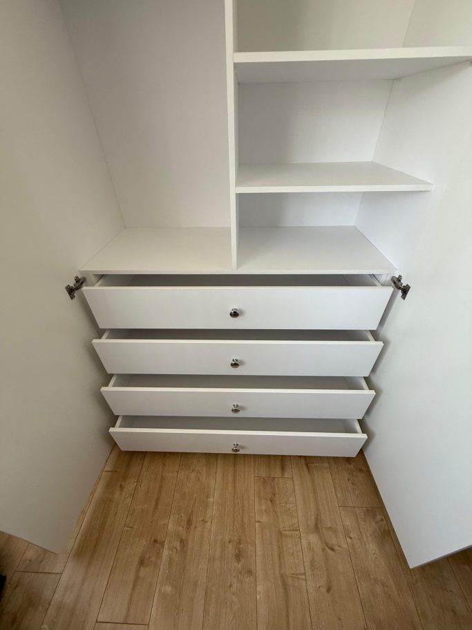 bespoke fitted hinged wardrobe with soft closing drawers, hanging space and adjustable shelving in Chatham, Kent.