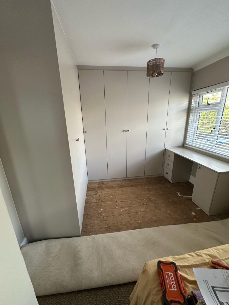 8 door bespoke fitted, made to measure corner hinged wardrobe with fitted dressing table in Kent and Maidstone.