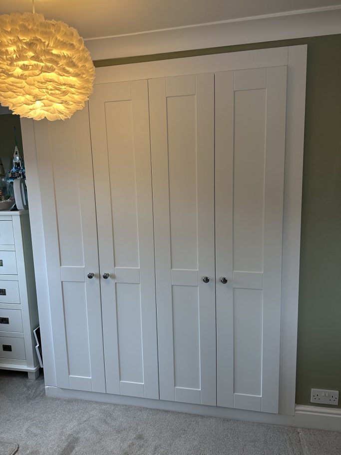 4 door made to measure, bespoke fitted hinged wardrobe in frost white in Kent.
