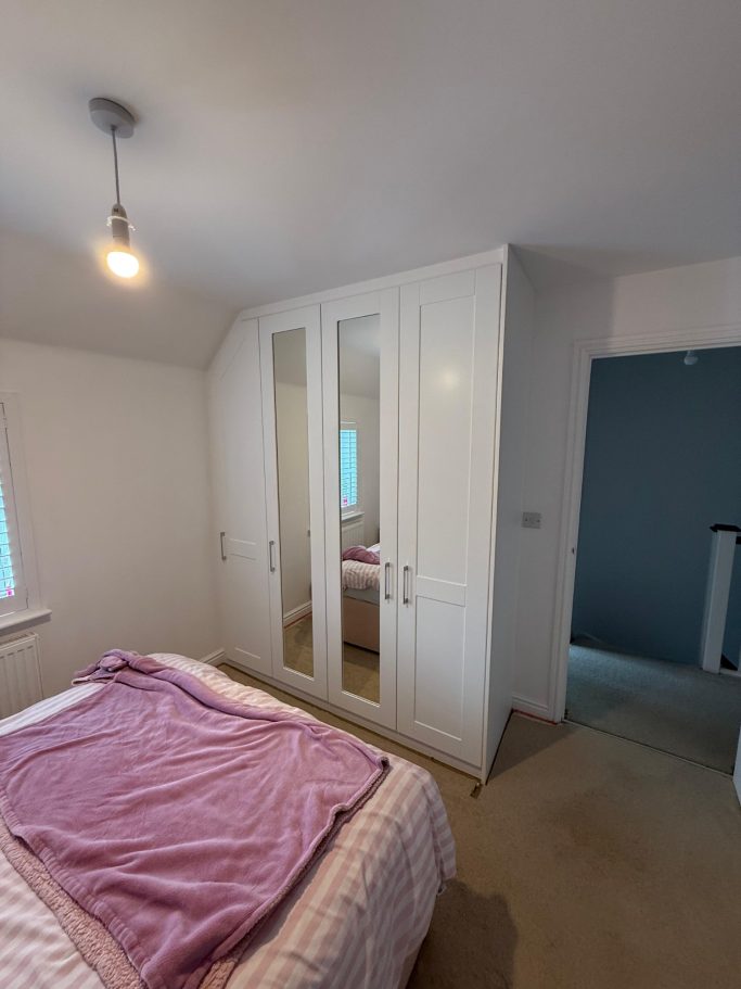 made to measure, bespoke fitted angled hinged wardrobe in Chatham, Kent
