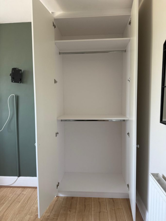 bespoke fitted hinged wardrobe with double hanging space and soft closing doors in Chatham, Kent