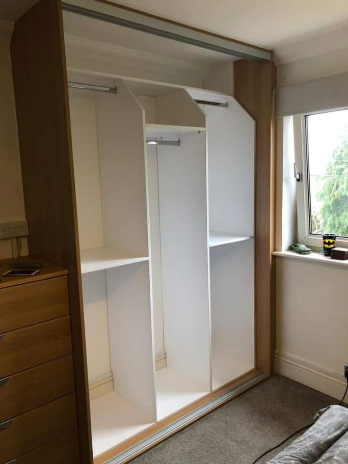 3 door made to measure, bespoke fitted sliding wardrobe  in Kent and Maidstone with a 5 draw, drawer unit fitted on the side.