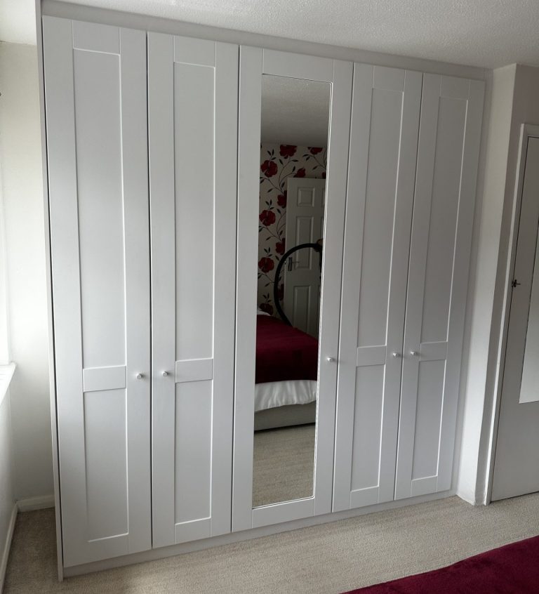 Custom fitted hinged wardrobe, tailor made to the customers unique requirements in Chatham, Kent.