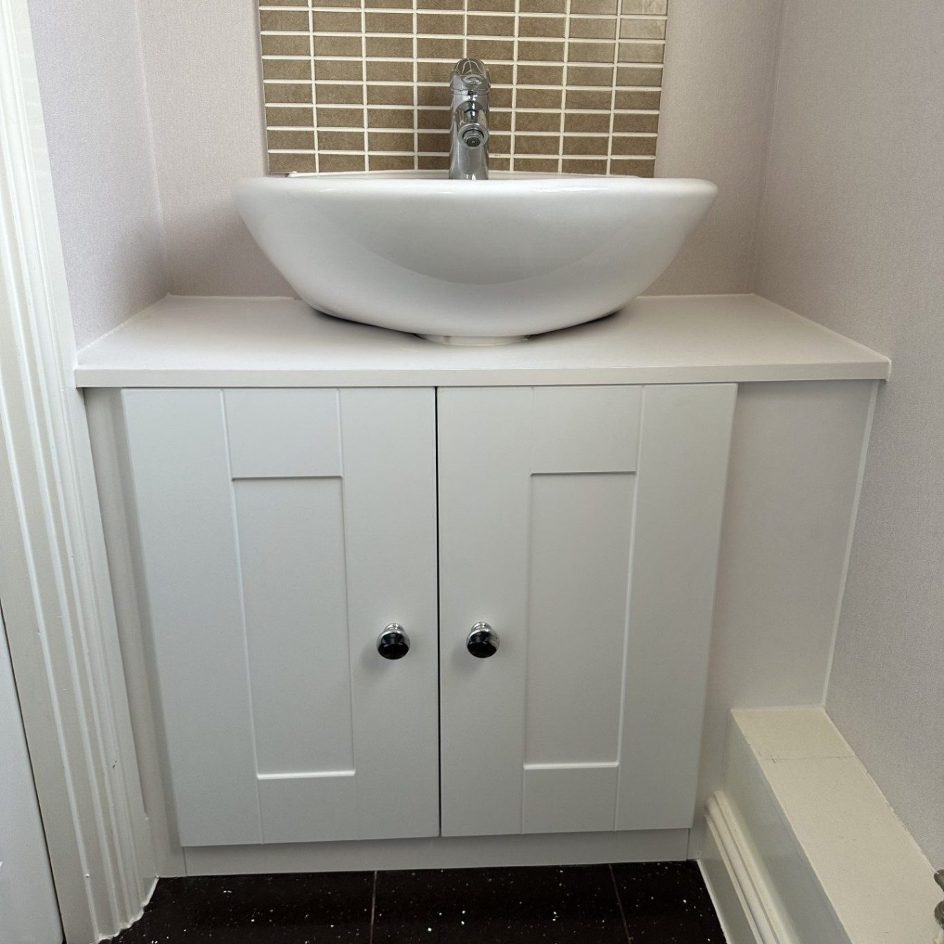 Custom made, storage solution for under the sink cupboard in Chatham Kent