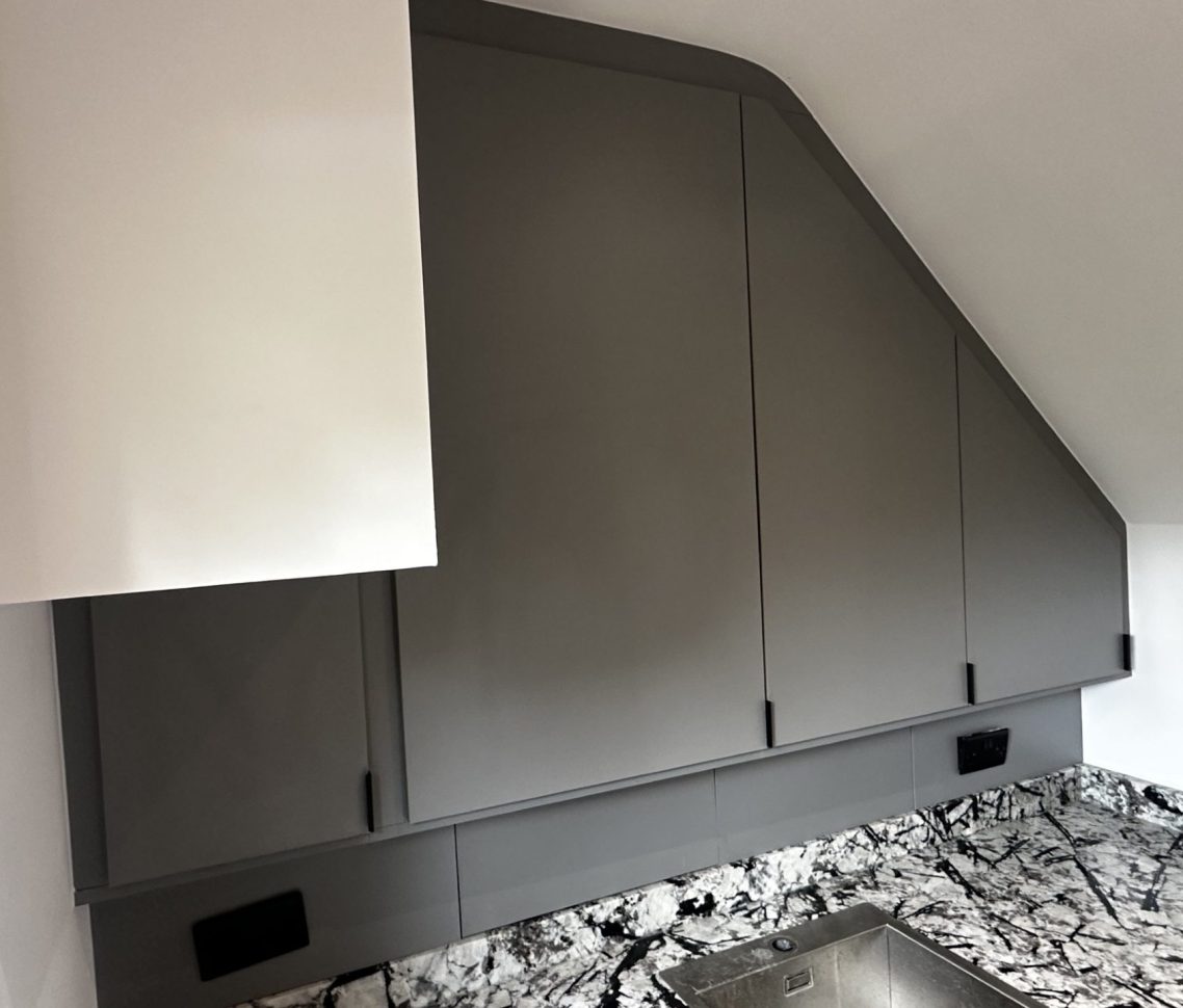 Custom made angled, utility storage cupboard in Chatham, Kent.