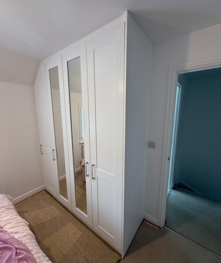 Bespoke fitted angled hinged wardrobe Bespoke fitted angled hinged wardrobe in Chatham, Kent