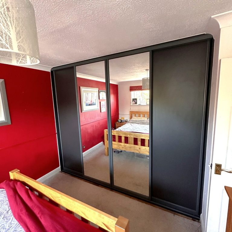 Made to measure, bespoke fitted sliding wardrobe with mirrored doors in Kent and Maidstone.