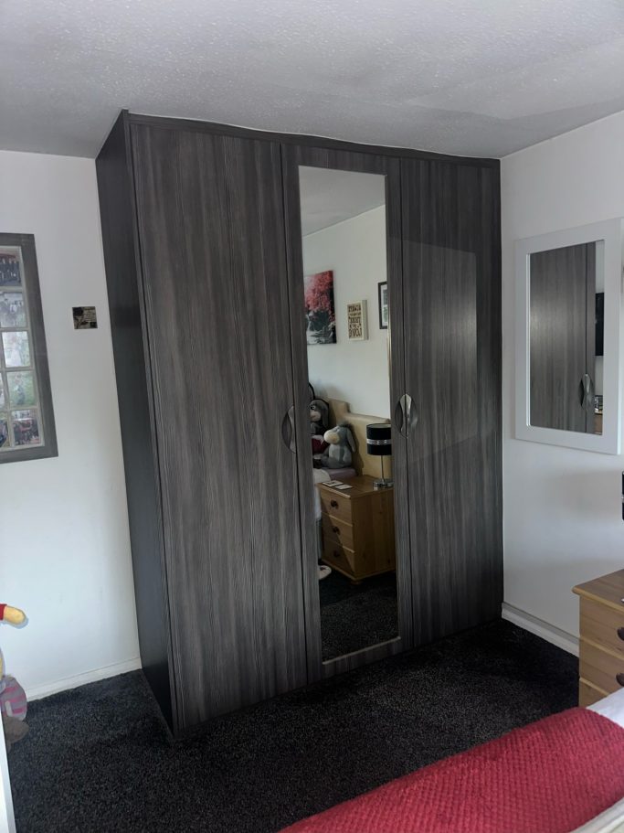 3 door made to measure, bespoke fitted hinged wardrobe in driftwood with 1 mirrored door in Kent.