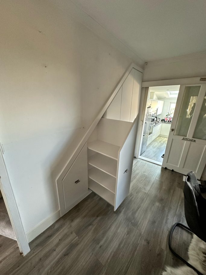 5 door bespoke, made to measure fitted understairs cupboards with 2 pull out storage boxes in Kent and Maidstone.