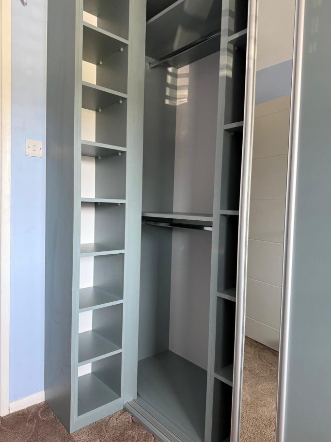 3 door sliding wardrobe with fitted drawer unit, framed mirror and overhead storage in Kent and Maidstone.