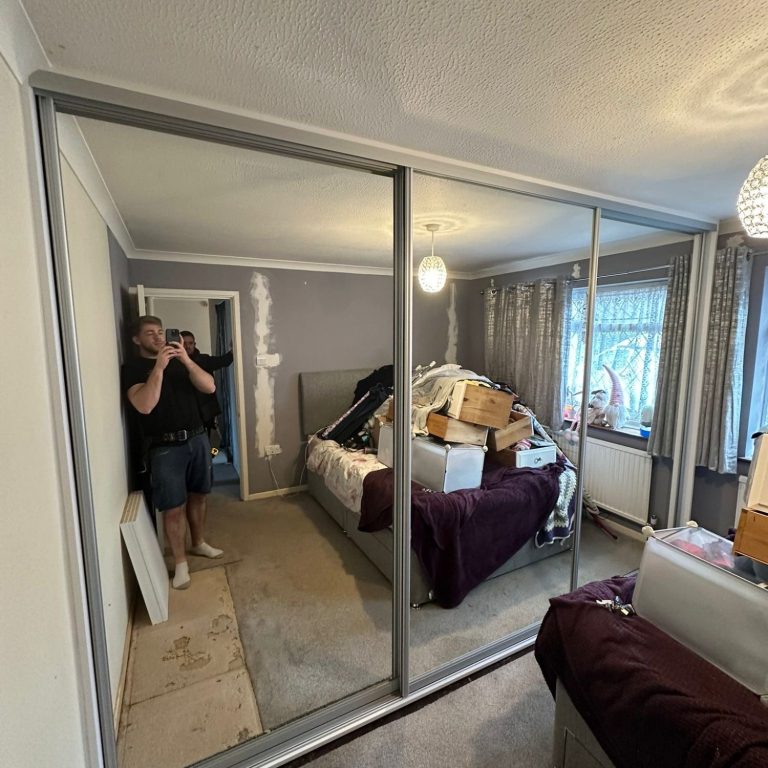 4 door made to measure, bespoke fitted sliding wardrobe with full mirrored doors in Kent and Maidstone.