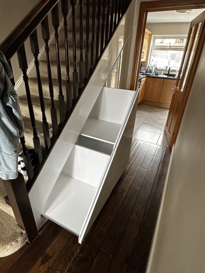 Bespoke fitted understairs storage solutions with pull out storage boxes in Chatham, Kent