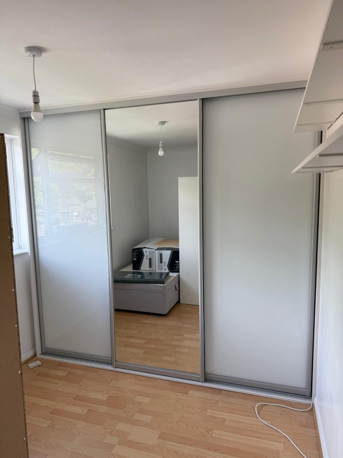 3 door bespoke fitted sliding wardrobe with full mirrored door in Kent and Maidstone.